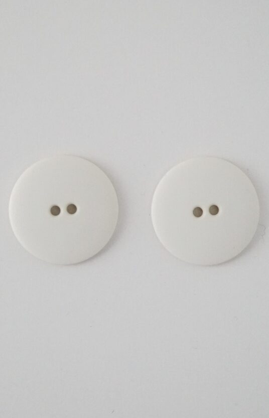 white plastic button