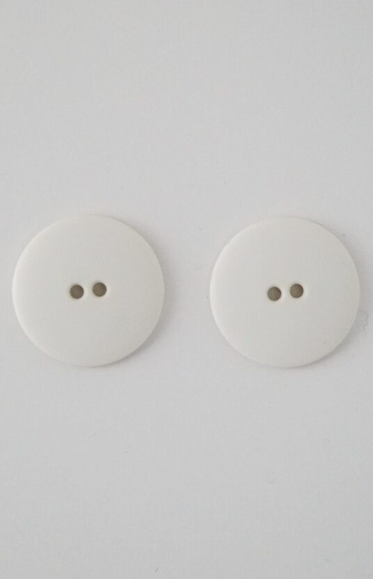 white plastic button