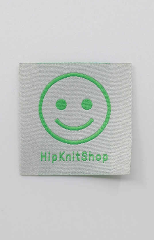 label strikk smiley