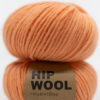 garn lys orange farge. pudderpiken strikk garn. Ullgarn ren ull nettbutikk garn og strikk inspirasjon strikkeprosjekt